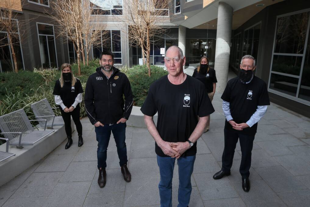 Terry Greaves is the man behind Terry's Big Bearded Ball Drop, with Brittany Evans, Sean Barrett of the Ovens Murray Football Netball League, and of the AWRCC Trust Fund, Kristy McMahon and David Baker providing support. Picture: TARA TREWHELLA