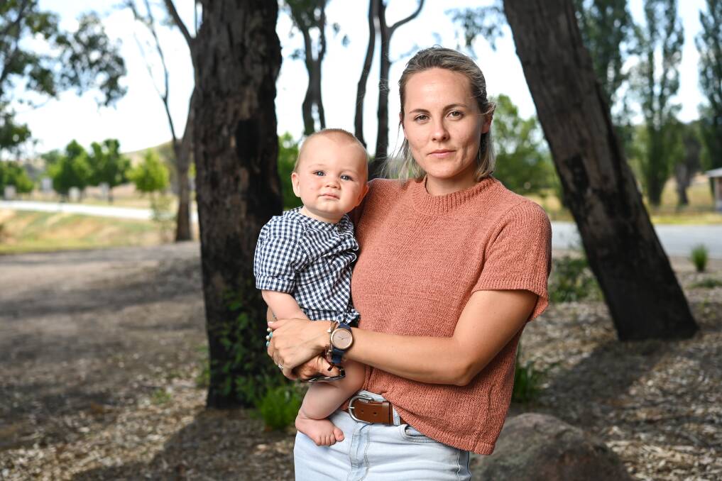BALANCE: Cath Joyce, 27, with her son Archie Davies, 9 months, is the vice-chair of the Towong community recovery committee. There are 11 across the wider shire area and Towong's has 50-50 under- and over-30. Picture: MARK JESSER