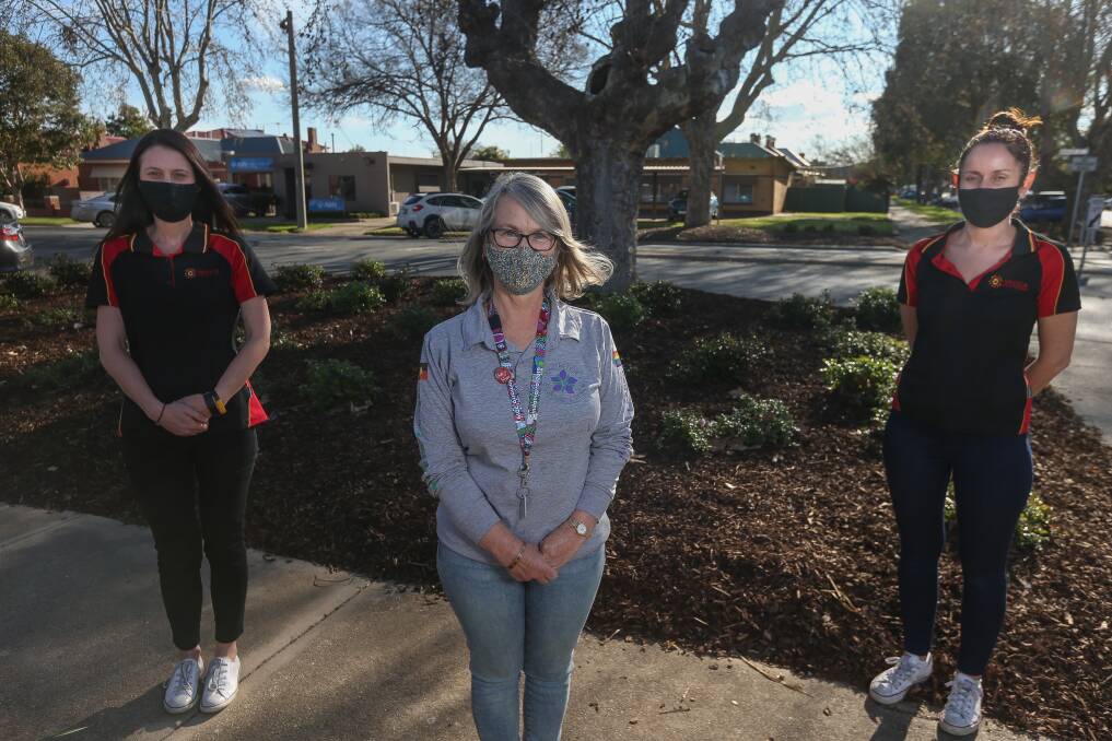UNITED: The Orange Door is extending to the Ovens-Murray, led by Centre Against Violence chief executive Kerry Burns (front). Tamrah Johnson and Hannah Clancy of VACCA will be part of the hub, which will be based in Wangaratta. Pictures: TARA TREWHELLA