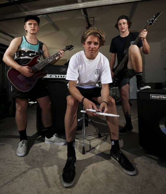 HEADBANGERS: Chiltern's Kobi Yates-Burger, 15, Reece Romero, 16, and Shaun Moore, 17 – known as Abdominal Incision – are representing the Hume in a youth competition in Melbourne next month. Picture: JAMES WILTSHIRE