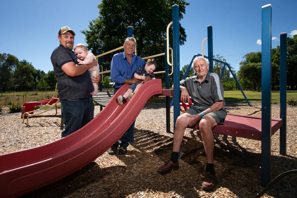 TOGETHER AGAIN: John Smith with Thomas, 7 months, Brian Smith with Joseph, 1, and Howard Smith in Corryong. Picture: JAMES WILTSHIRE