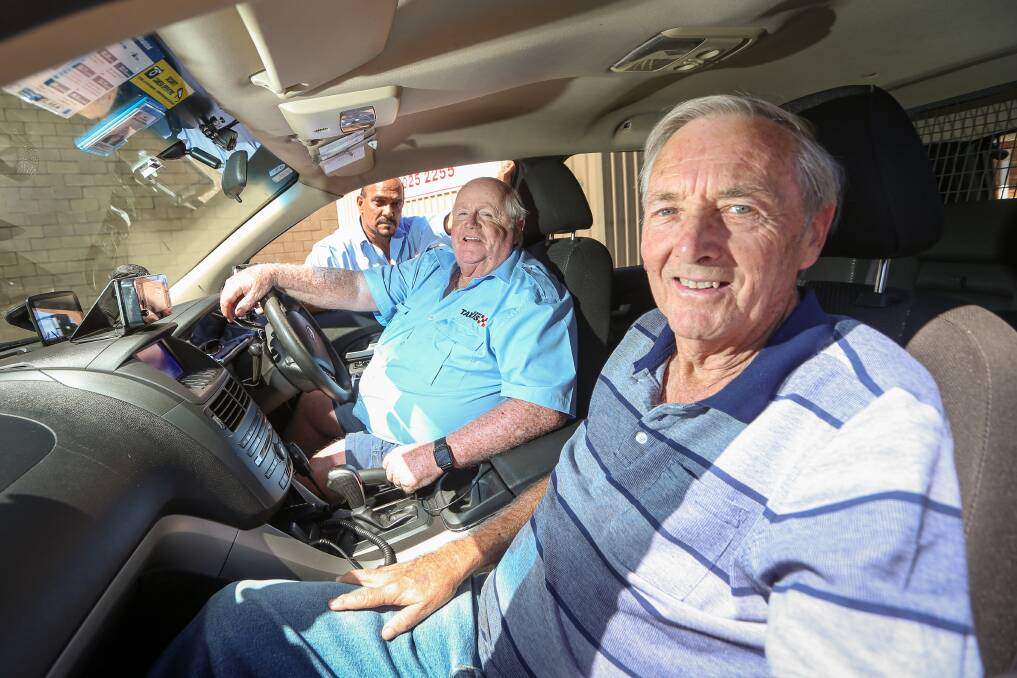 SURPRISE: Albury Taxi Drivers Mohammed Umarji and Wayne Wilesmith, and chairperson Bob Plummer, are excited for the competition. Picture: JAMES WILTSHIRE