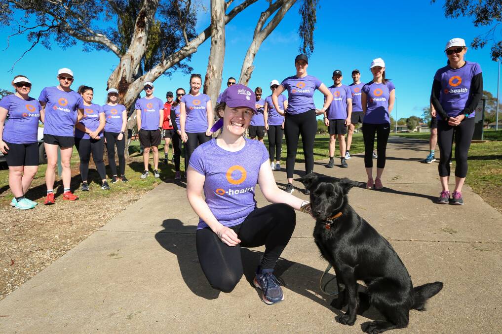 TOGETHER: Sheila Smith, with her dog, Remi, co-ordinated the Run Walk 4 Brain Cancer on Sunday, linked virtually to other groups on the Border. She and O-Health colleagues set off from Bonnie Doon Park. Picture: JAMES WILTSHIRE
