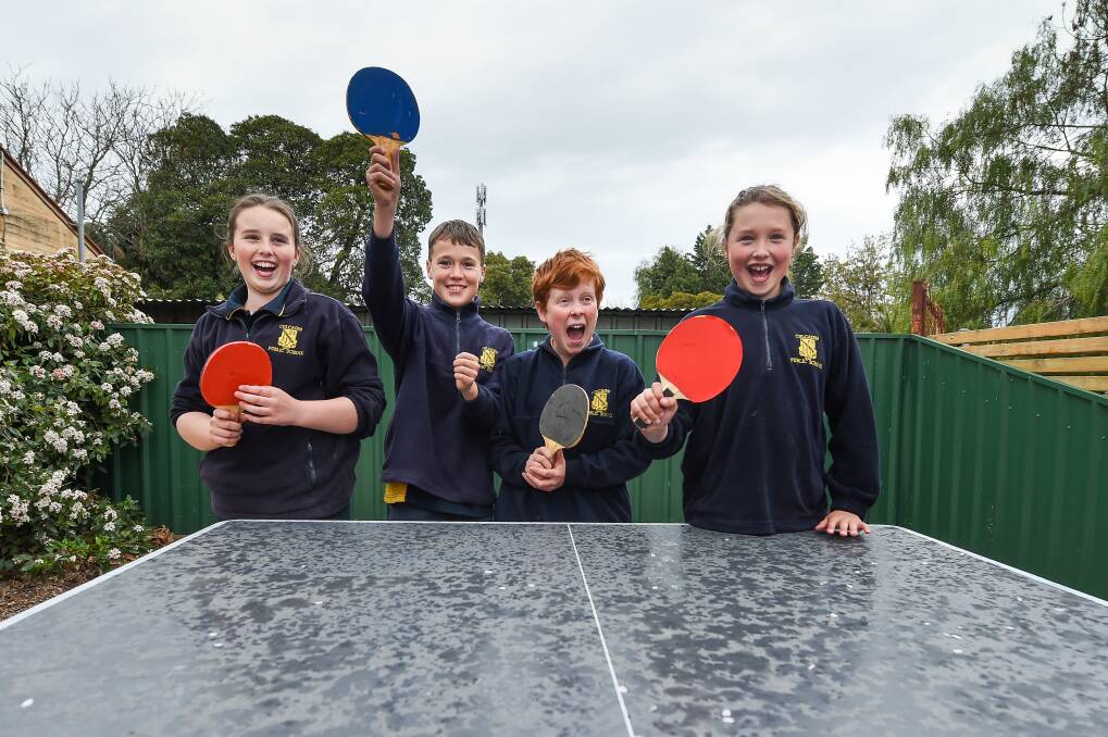 PLAY ON: Culcairn Public students Priya Godde, 11, year 6, Thomas Hamson, 12, year 6, Angus Boyce, 11, year 5 and Ava Smith 10, year 5, use the town's new table tennis table installed during the challenge. Picture: MARK JESSER
