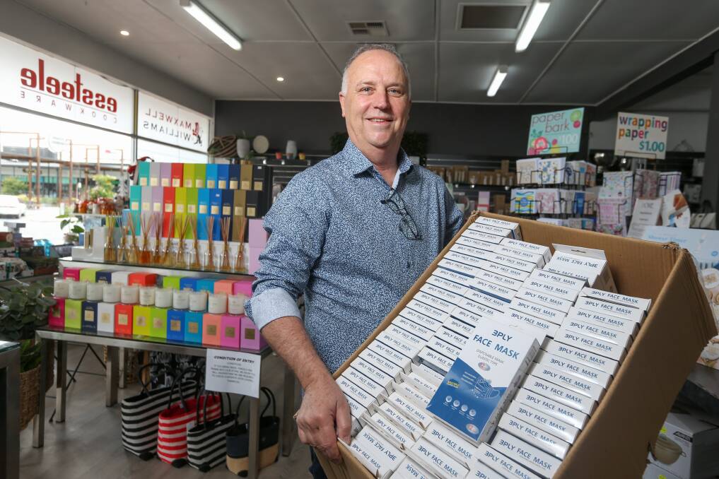 SURPLUS TO NEEDS: Home Inspirations owner David Bowring will not be needing his supply of face masks anymore, with masks only being mandatory in shopping centres, supermarkets and department stores. He expects many will shoppers will choose to keep wearing them. Picture: TARA TREWHELLA