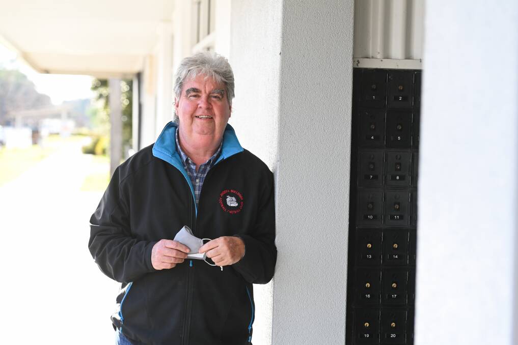TAKING CARE: Pat Hayes of the Jindera Post Office says people in the town have been shocked by the listing of an exposure site at the Shell. Picture: MARK JESSER