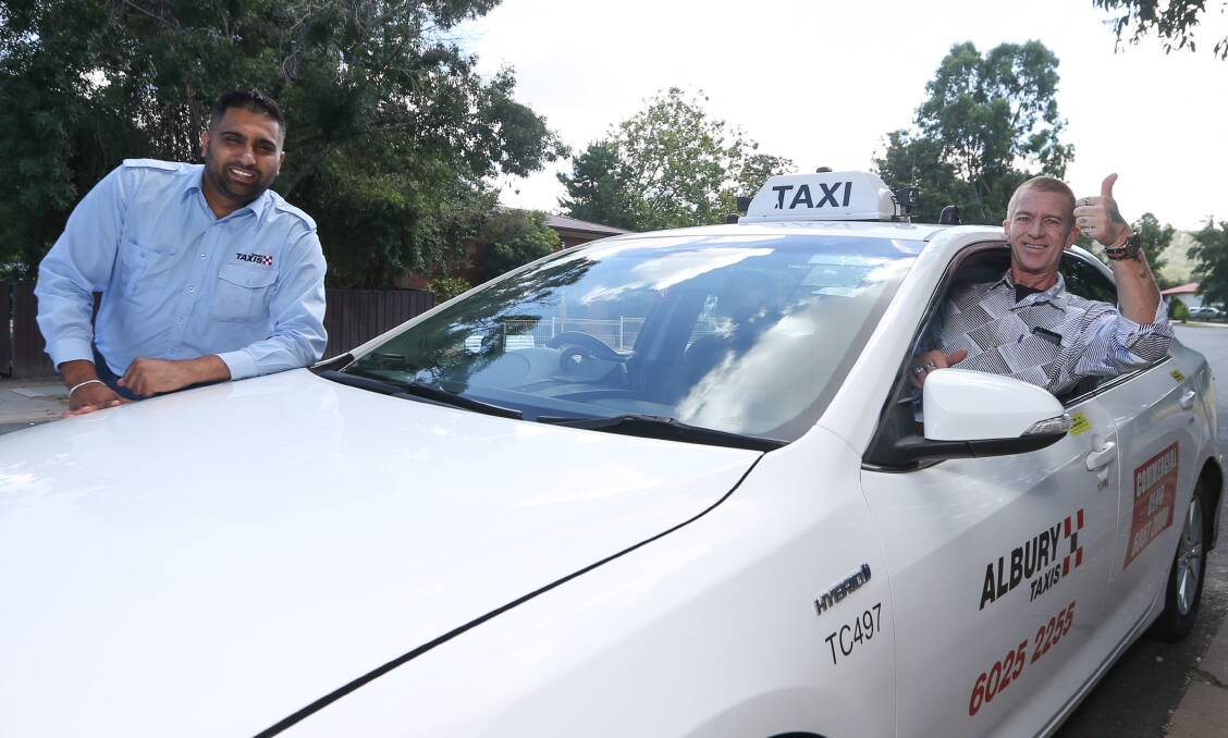 WINNER: Driver Manpreet Heer Bhangu drove Albury Taxi's three-millionth customer since 2012, Garth Stead, on a prize-winning trip. Picture: TARA TREWHELLA