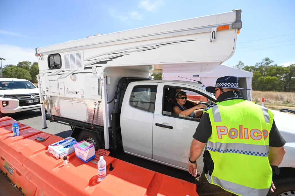 A caravan driver is checked at the Bandiana Link on Monday. Picture: MARK JESSER