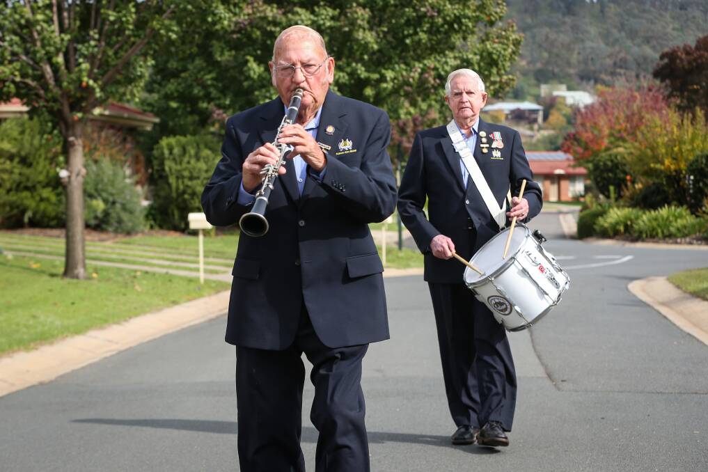 MARCHERS: Ken Polkinghorne and Kevin Burns usually play for the Albury City Band in the ANZAC Day March. If it had proceeded, it would have been Mr Burns' 75th year. Picture: JAMES WILTSHIRE
