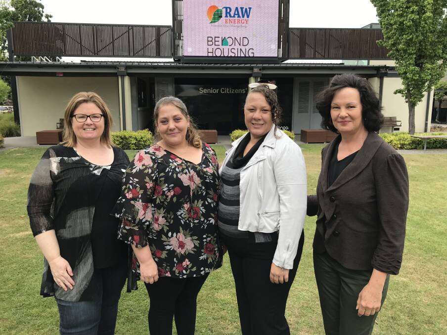 SWITCH ON: Renewable Albury-Wodonga Energy president Bobbi McKibbin, BeyondHousing clients Katie and Jackie, and BeyondHousing's Leisa Makszin celebrated the project putting solar on social housing properties.