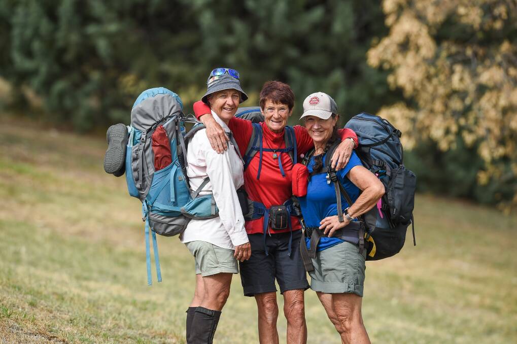 WHAT AN EFFORT: Sally McPhee, Jeannie Whittaker, Karen Lynch completed the entire Hume and Hovell Track yesterday after setting off in March. Picture: MARK JESSER