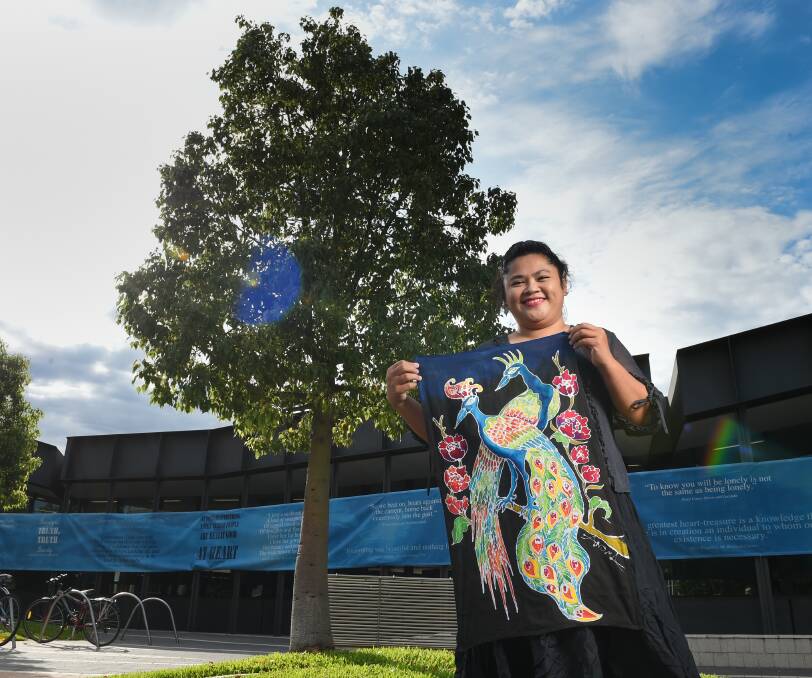 BUDDING ARTIST: To celebrate Monday's Harmony Day, Jinyapa Oupatham will be running a batik workshop, a traditional Thai art form, on Saturday. Picture: MARK JESSER