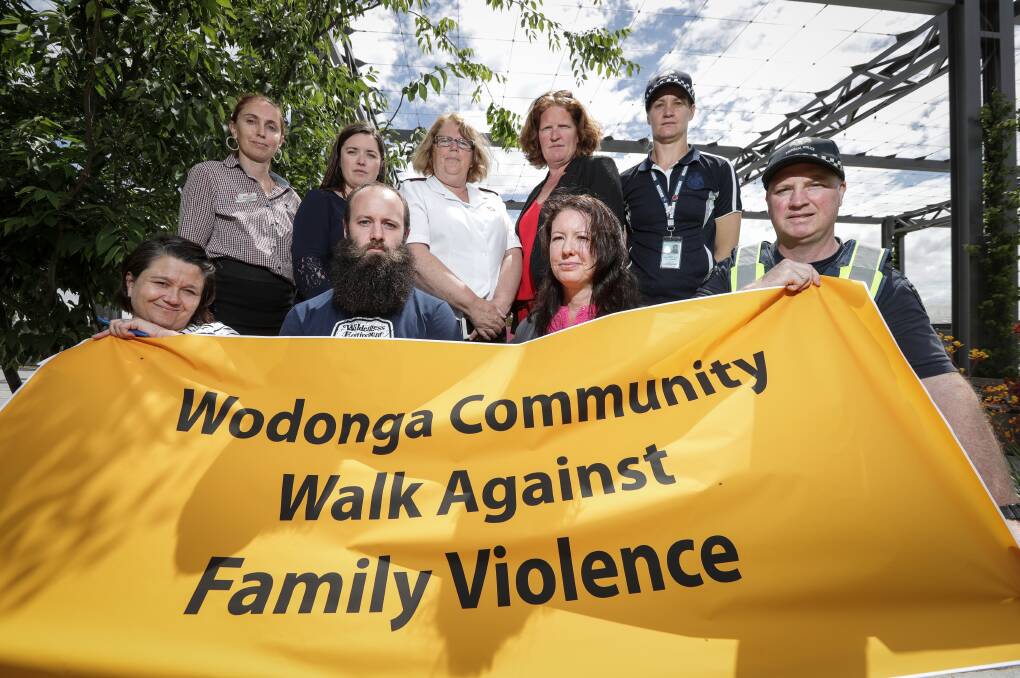 UNITED: Members of Junction Support Services, the Salvation Army, Wodonga Police, and other local agencies will walk on Wednesday. Picture: JAMES WILTSHIRE