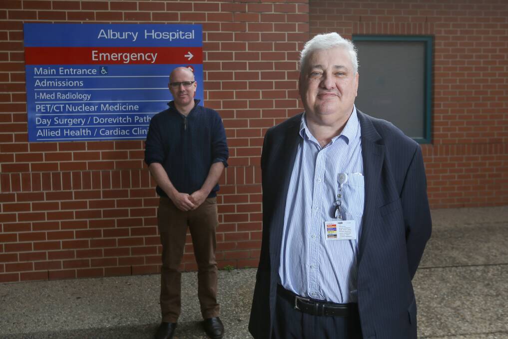 SECURED: Albury Wodonga Health clinical director of emergency David Clancy and chief executive Michael Kalimnios are glad to have secured locums from Sydney to address short-term ED workforce shortages due to a ban on Melbourne doctors. Picture: TARA TREWHELLA
