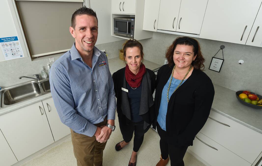 NEXT STEP: 3NE General Manager Owen Godenzi with NESAY's Fair Feed project worker Melissa Van Bergen and chief executive Leah Waring. Picture: MARK JESSER