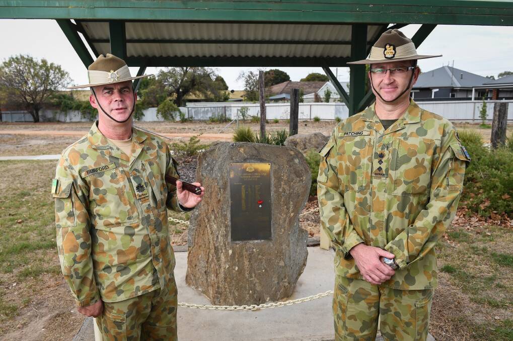 PAYING TRIBUTE: Warrant Officer Class One Jason Burford and Army Logistic Training Centre Commandant Matt Patching. Picture: MARK JESSER