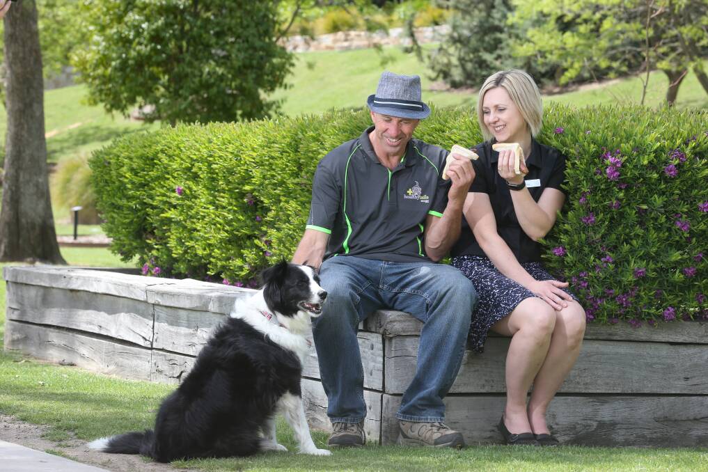 JOINT PASSION: Owen Hogg, from Mars Petcare, with his dog Miley and Alison Delphin from Albury Wodonga Health. Picture: KYLIE ESLER