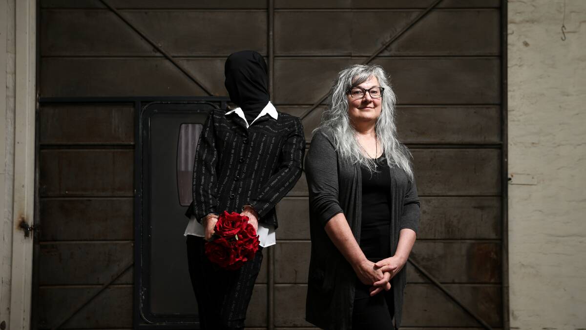 Albury artist Julie Kruger with her piece for a Step Out Against Violence exhibition. Picture: JAMES WILTSHIRE