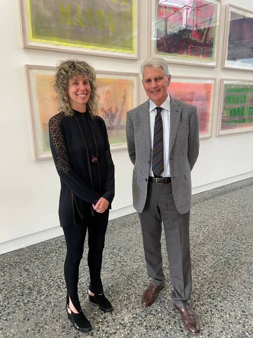 PROVEN FORM: Murray Art Museum Albury director Bree Pickering and MAMA Art Foundation chair Tony Smith with one of the entries to the National Photography Prize. 