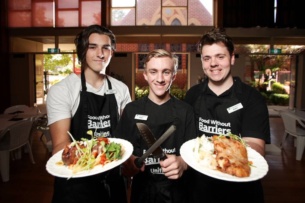 EAT UP: Harrison Bogie, 17, Jessi Kemper, 16, and Jarrod Condron, 17, are taking part in the Food Without Barriers program through Wodonga TAFE. Picture: JAMES WILTSHIRE
