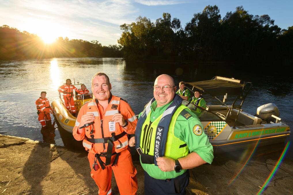 PLAY IT SAFE: NSW SES Albury Unit commander Curtis Kishere and Albury and Border Rescue Squad captain Paul Marshall are glad to see people on the water but are encouraging them to stay safe. Picture: MARK JESSER