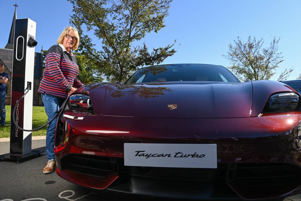 SLEEK: Jen Bailey of Albury got to drive Porsche's first all-electric car, the Taycan, during the Porsche in Motion display at QEII Square in Albury. Picture: MARK JESSER
