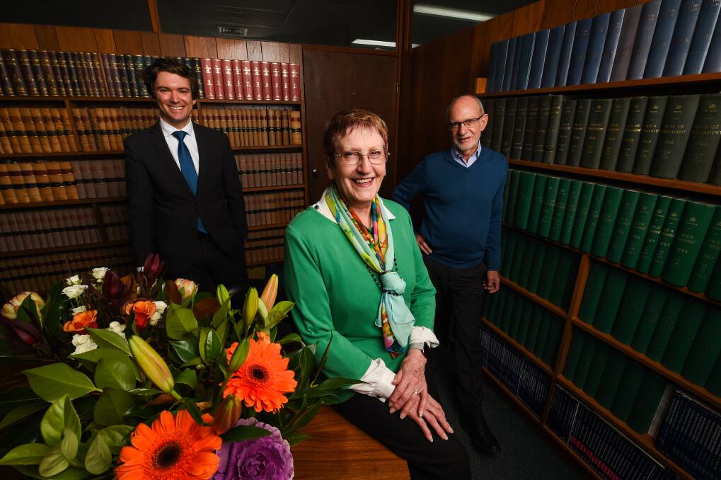 MILESTONE: Mavis Ohlson is celebrating 50 years of continuous service at McHargs Solicitors in Wodonga, where Adam Koster and Warren Judd are directors. She drives in from Corowa every day. Picture: MARK JESSER