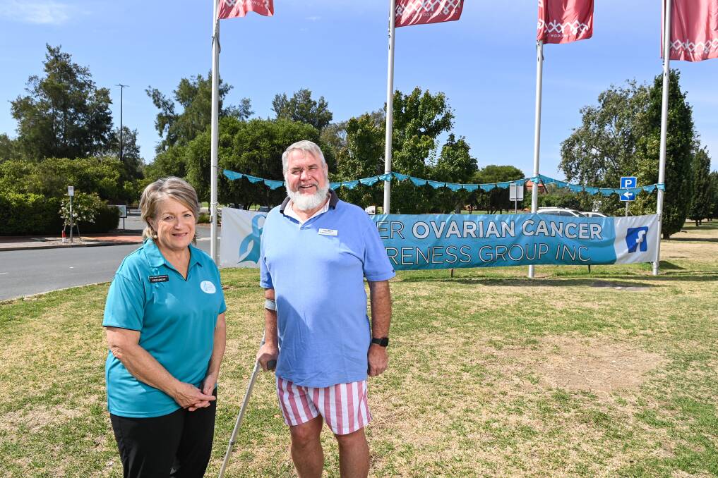 FLY HIGH: Border Ovarian Cancer Awareness Group president Heather Watts and Albury Wodonga Regional Cancer Centre board member John Watson say February is an important month for ovarian cancer awareness. Picture: MARK JESSER