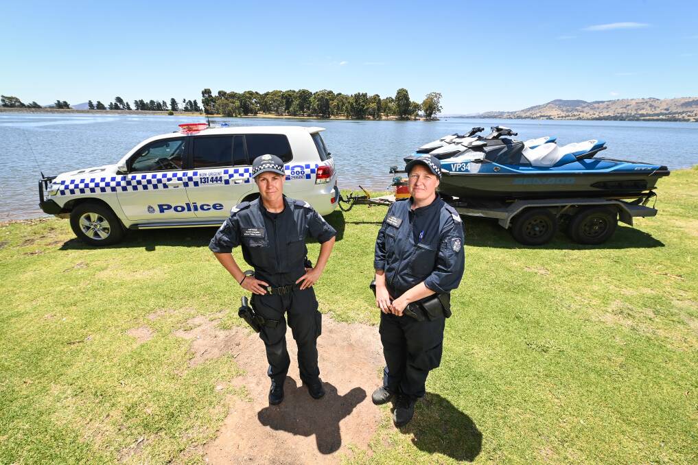 WATCHING: Senior Constable Ash Fennell and Senior Constable Lauren Foley of Victoria Police's Water Squad were on Lake Hume this week. Picture: MARK JESSER