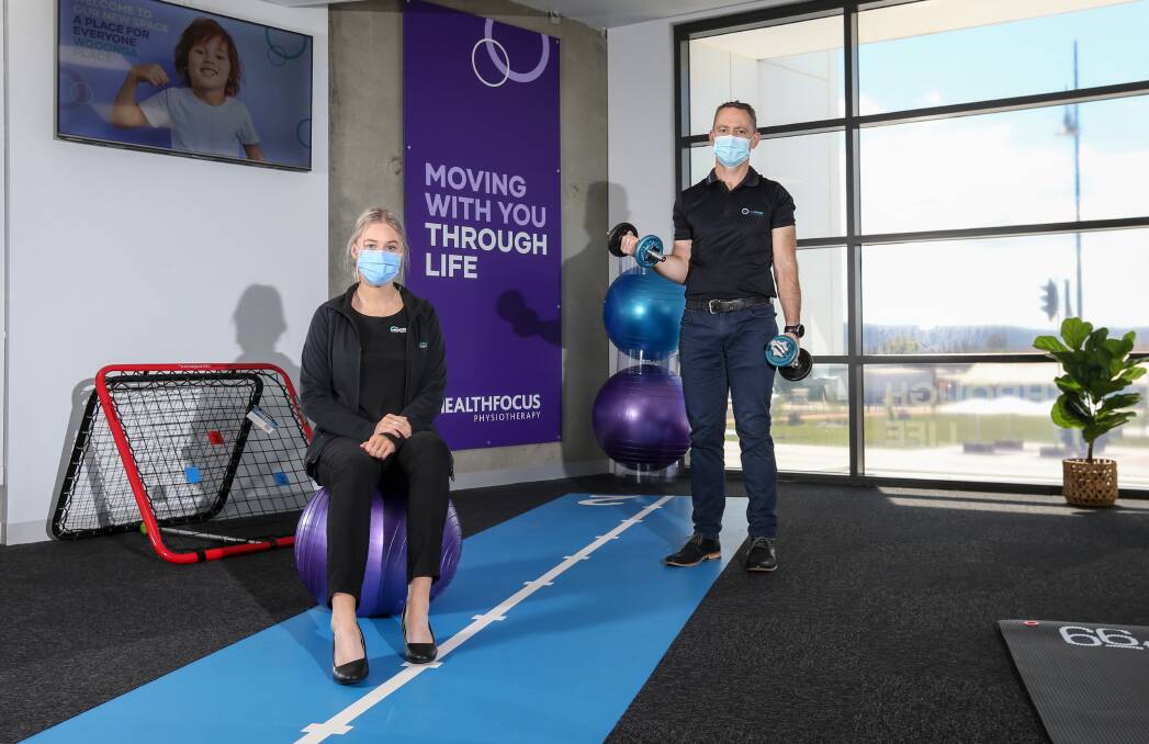 MODERN: Healthfocus Physiotherapy has opened a clinic in the Wodonga Woolworths complex. Administration officer Felicity Prenter and principal Michael Bowler saw the first clients on Monday. Picture: TARA TREWHELLA