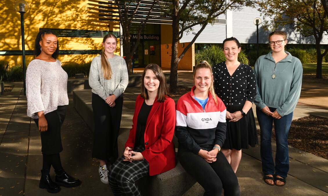 SELECTED: Melania Atuwaogu and Ella Harris met last year's Destination Australia recipients Madalynn Baumanis and Sophie Hewatt, with Alice Meravi and Liliana Isbister also being awarded scholarships this year. Picture: MARK JESSER