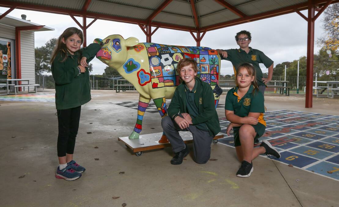 MOO-VING: St Mary's Primary School Rutherglen has taken part in the Picasso cows program, with Connie Morris, year 2, Elijah McFarland, year 5, Isla Verhulst, year 2 and Carvyn Stubbs, year 5 contributing. Picture: TARA TREWHELLA