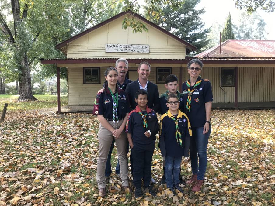 1st Myrtleford Scouts Group group leader Bernadette Hays, Surrey Hunter and scout group members with Indi Liberal candidate Steve Martin, who says a re-elected Coalition government will give $250,000 to a new scout hall.
