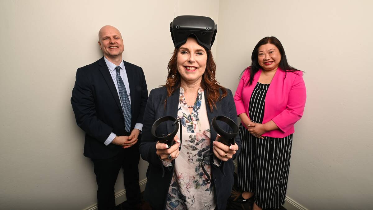 NEW OUTLOOK: Mercy Connect's Trent Dean and Caroline Cummins, and Irene Blackberry are working on the VR project. Picture: MARK JESSER