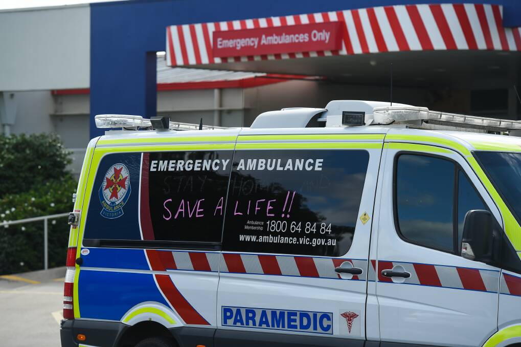 An ambulance outside Wangaratta Hospital asks people to stay home to stop the spread of COVID-19. Picture: MARK JESSER