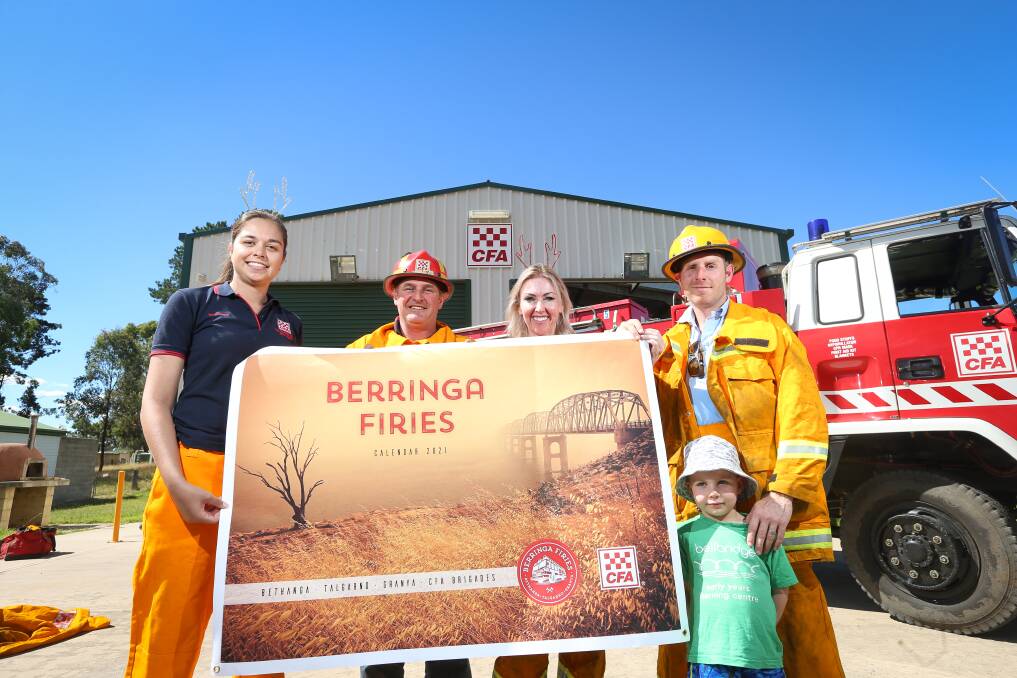 WHAT A YEAR: The Berringa Firies Calendar, supported by Talgarno CFA member Mari Green, Granya captain Ken Star and Bethanga's Mel Naismith and Joe Calvert, with his son Josh, 3, is on sale. Picture: JAMES WILTSHIRE