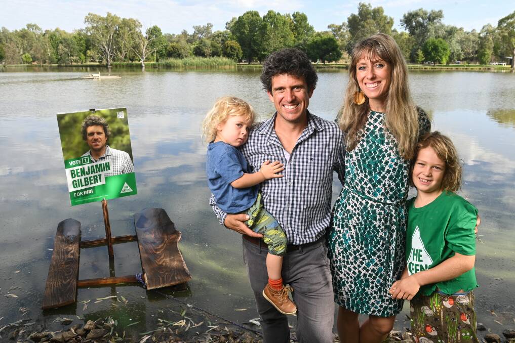 IN TRAIN: Yackandandah sculptor Ben Gilbert at the (literal and symbolic) launch of his Indi campaign with wife Tijana and kids Moliere, 3 and Fela, 7. Picture: MARK JESSER