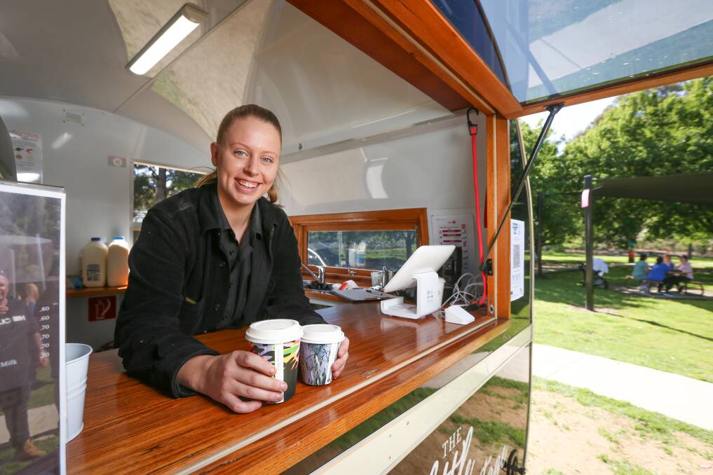 NEW SPOT: The Little Vintage Van operated by disability support organisation ConneXtions began appearing at Les Stone Park this week. Employee Rochelle Smith wants to take the van to events. Picture: JAMES WILTSHIRE