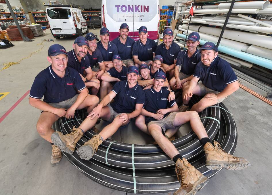 GOOD CAUSE: The team at Tonkin Plumbing in Albury, lead by James Tonkin (front left) has raised more than $10,000 for 'Movember'. The majority of their male workforce got involved. Picture: MARK JESSER