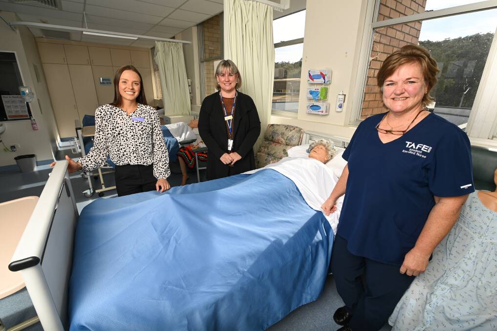 PATHWAY: TAFE NSW Albury's Danielle Roberts is teaching the Diploma of Nursing, supported by Albury Wodonga Health's Sally Squire. Rienie Fourie is on track to be one of the first graduates. Picture: MARK JESSER