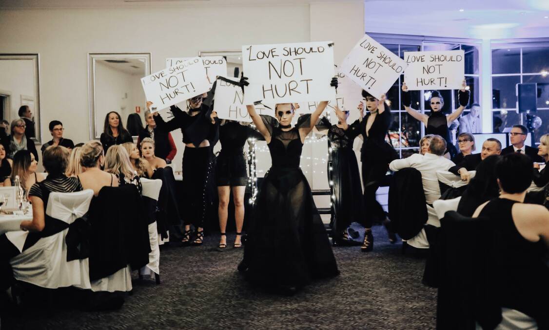 NOT OKAY: A domestic violence survivor shares her story of leaving an abusive husband in Albury, following a community-led White Ribbon Ball, co-ordinated by hairdresser Zoe Wilde. Picture: KELSEY JAYNE PHOTOGRAPHY