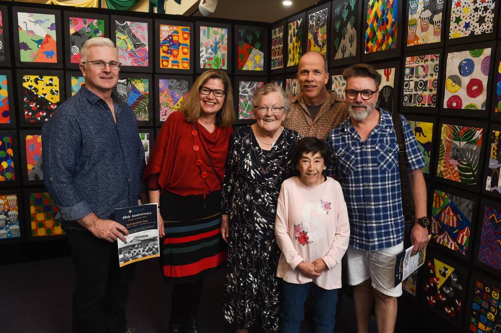 Sister Mary Duffy, former teacher at Catholic College Wodonga, with some of her former students including Matt Pini (left) Picture: MARK JESSER