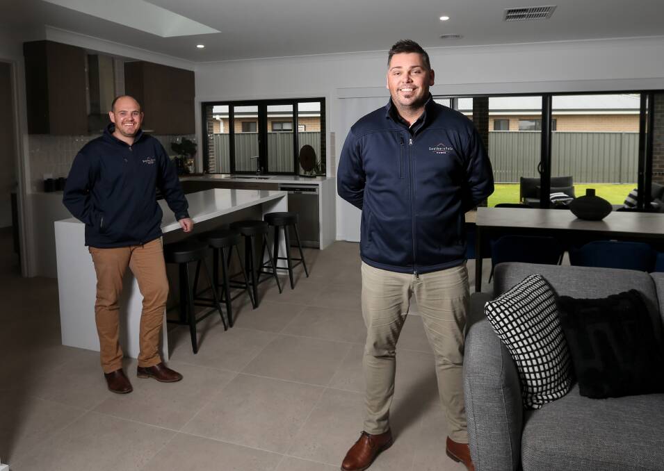 INTEREST: Southern Vales Homes new homes sales consultant Joel Mallatt and sales manager Matt Griffiths have been flat out with interest in builds. Picture: TARA TREWHELLA