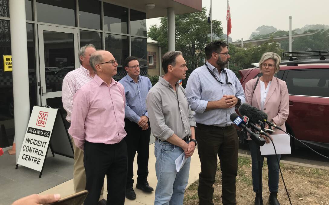 Federal Health Minister Greg Hunt addressed the media at the Wodonga Incident Control Centre about funding for mental health and research into smoke impacts.