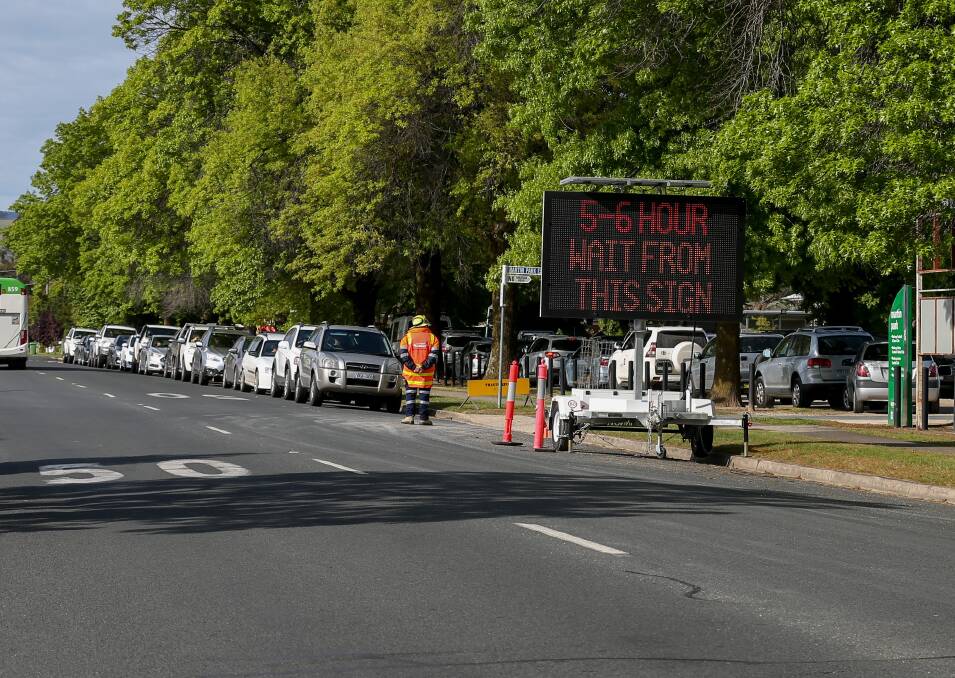 WAIT: Wodonga's COVID testing clinic had a wait of up to six hours before 9am, with cars snaking around Martin Park. MP Sussan Ley is taking up the need for more resources on the NSW side. Picture: TARA TREWHELLA