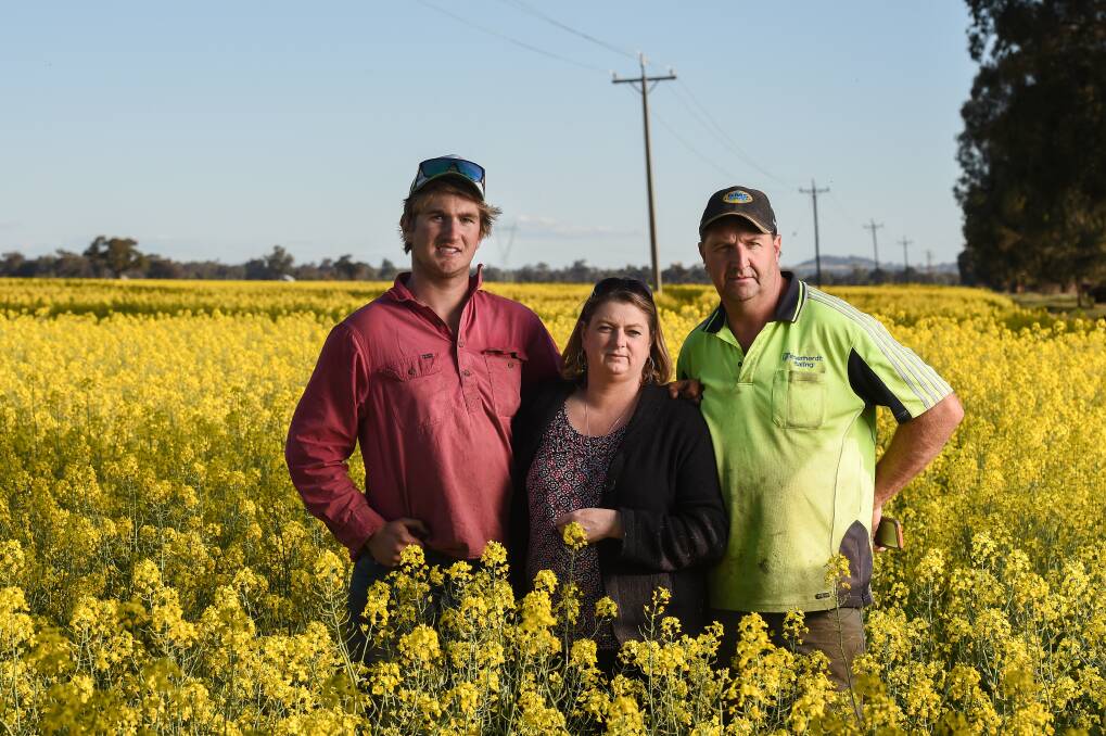 LEADING: The  Feuerherdt family (Josh, Sharon and Stephen are pictured) want the government to protect agricultural land from solar developments and were heartened by support at a forum. Picture: MARK JESSER