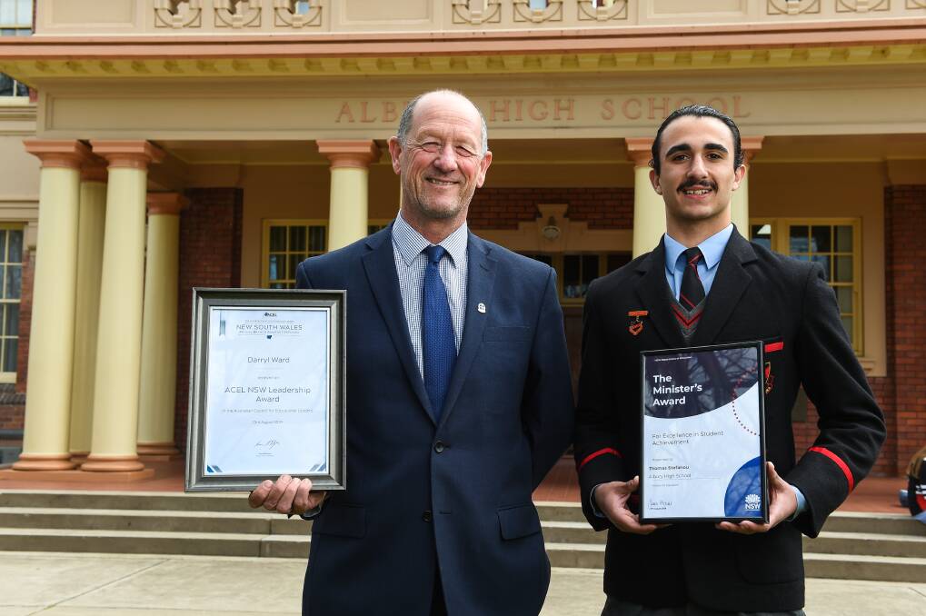 PROUD: Albury High principal Darryl Ward and school captain Thomas Stefanou, 18, have been recognised with awards. Picture: MARK JESSER