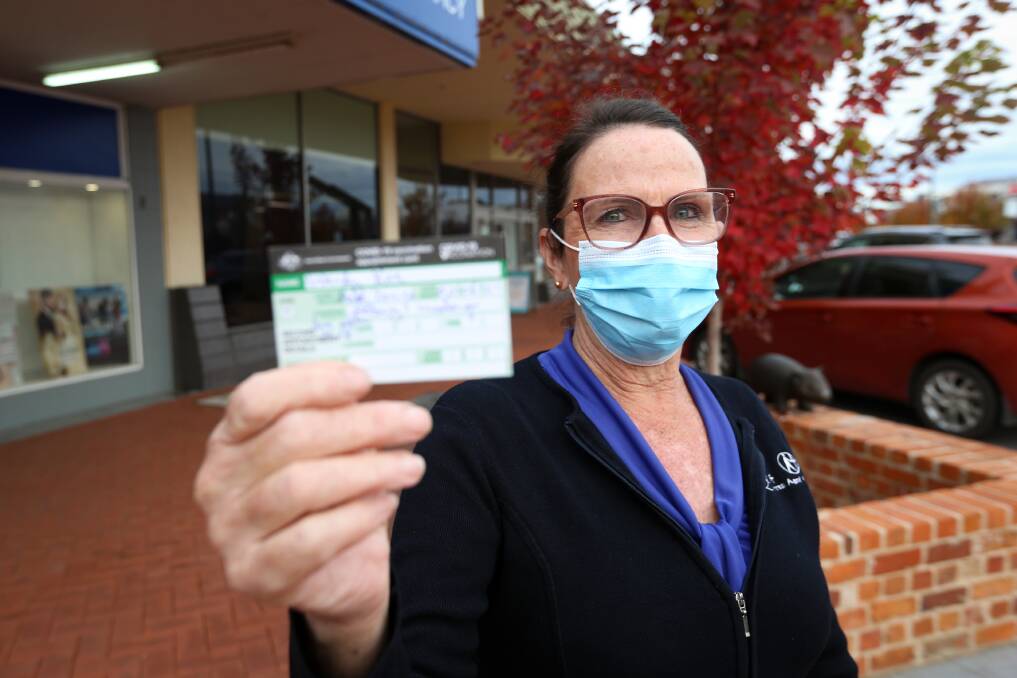 COVERED: Lutheran Aged Care Albury worker Wendy Rice received her first AstraZeneca vaccine as one of many aged and disability care workers who got priority access at the AWH hub. Picture: JAMES WILTSHIRE