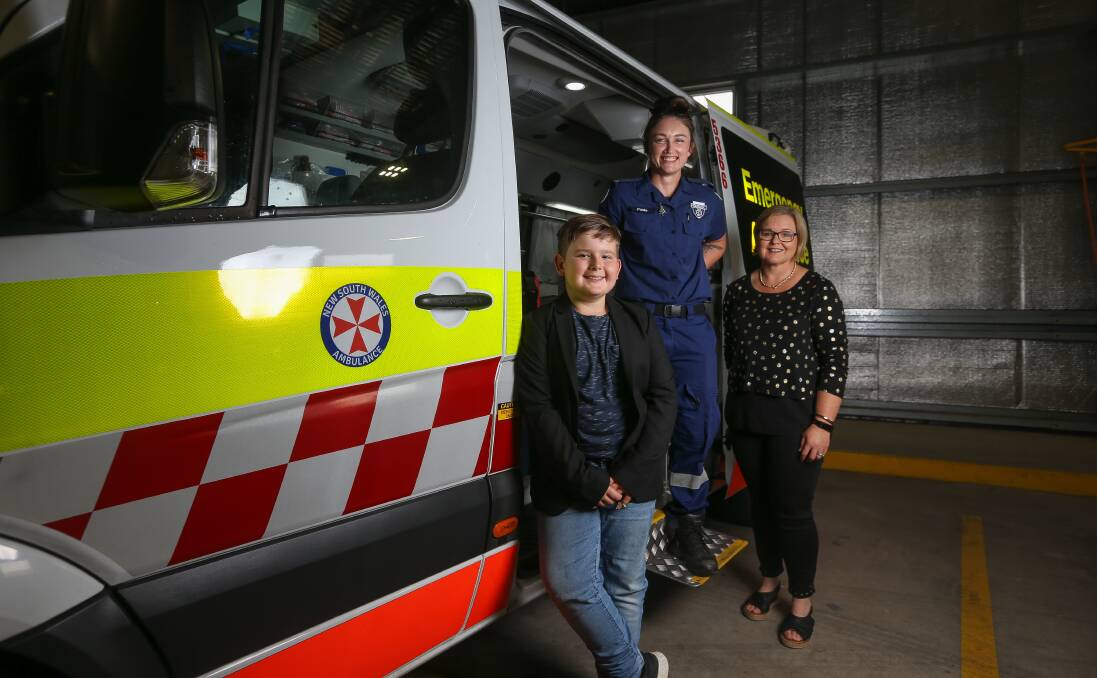 QUICK THINKING: Tom Steinhauser, 10, sprung into action after noticing his mum Chelsea losing consciousness last week. Paramedic Paula Mitchell arrived on scene soon after. Picture: TARA TREWHELLA