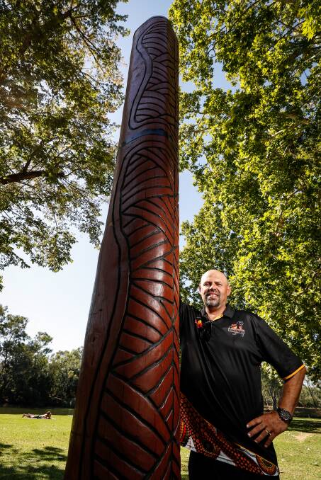 MIGHTY: Darren Wighton, an artist and teacher, created Totem Pole (River Gauge) over eight weeks for a Albury Council project upgrading Noreuil. Picture: JAMES WILTSHIRE
